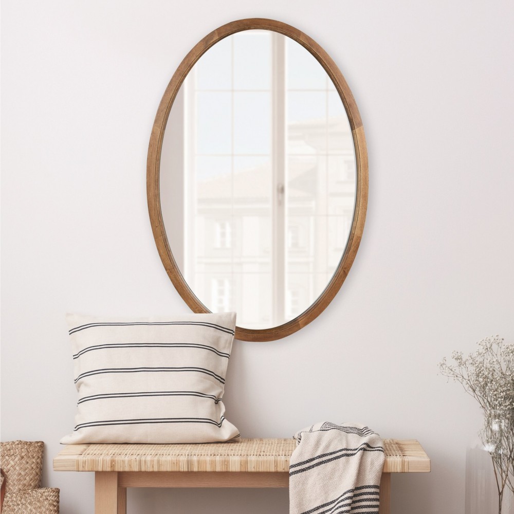 Folosiți o oglindă ovală pentru a ilumina o cameră, hol, baie, bucătărie sau dormitor